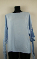 Błękitna bawełniana bluzka z wiązaniem oversize