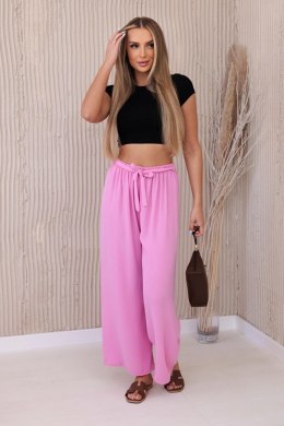 Spodnie z szeroką i wiązaniem w pasie jasno różowe