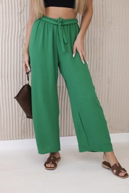 Spodnie z szeroką i wiązaniem w pasie zielone